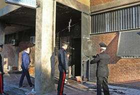 Gas canisters detonated outside Italian police station
